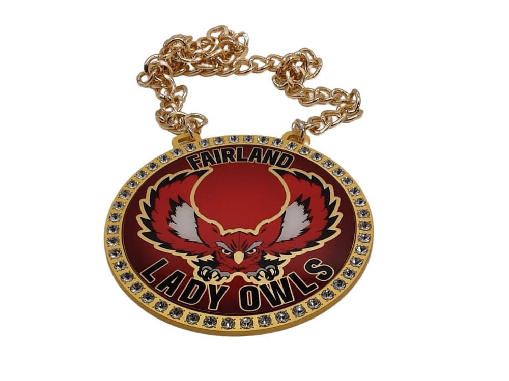 Custom championship chain with a round stone-set team medallion in red and gold