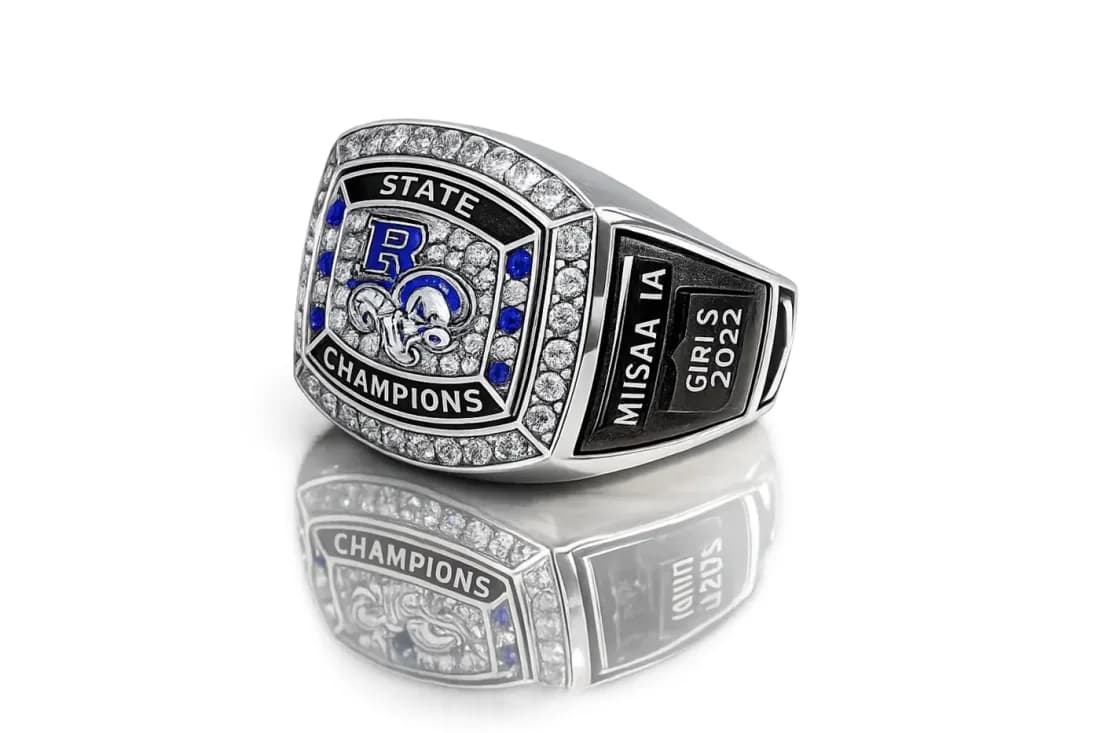Finished custom championship ring by Colucci Custom Awards, shown here as a club champions ring. Your own artwork replaces the design shown.