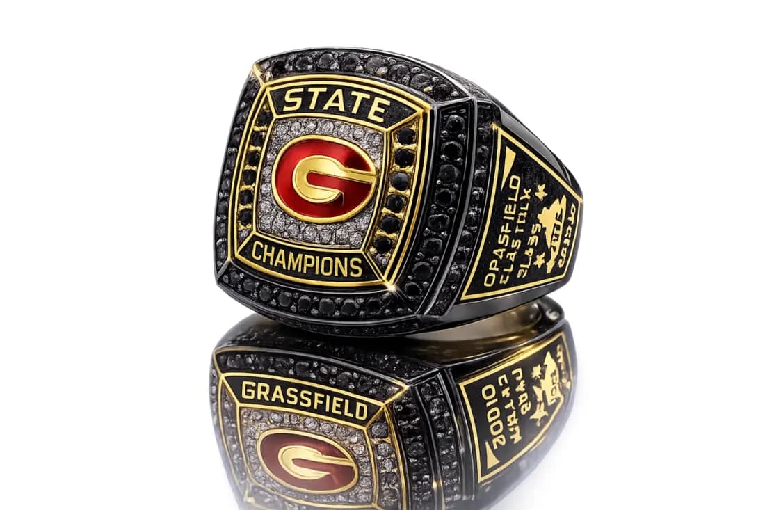 Finished custom championship ring by Colucci Custom Awards, shown here as a state champions ring. Your own artwork replaces the design shown.