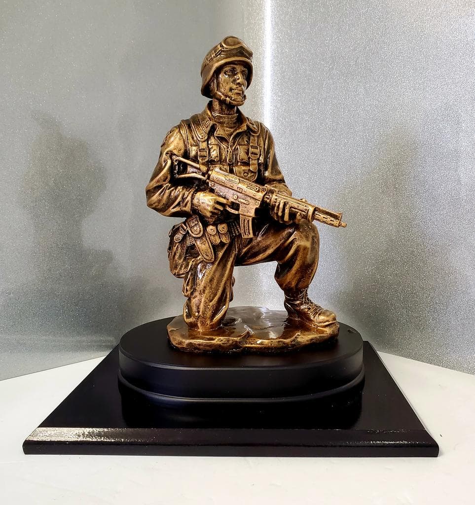 Elite custom-sculpted multi-piece trophy with premium plating and figure detail