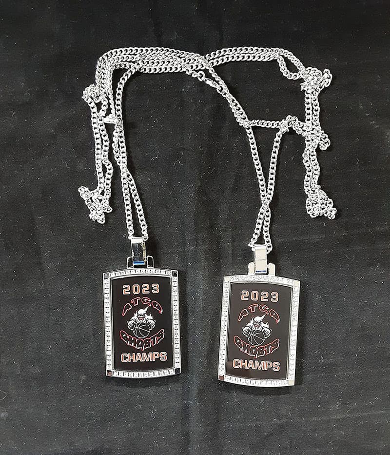 Elite custom basketball championship dog tags with gold plating and deep engraving