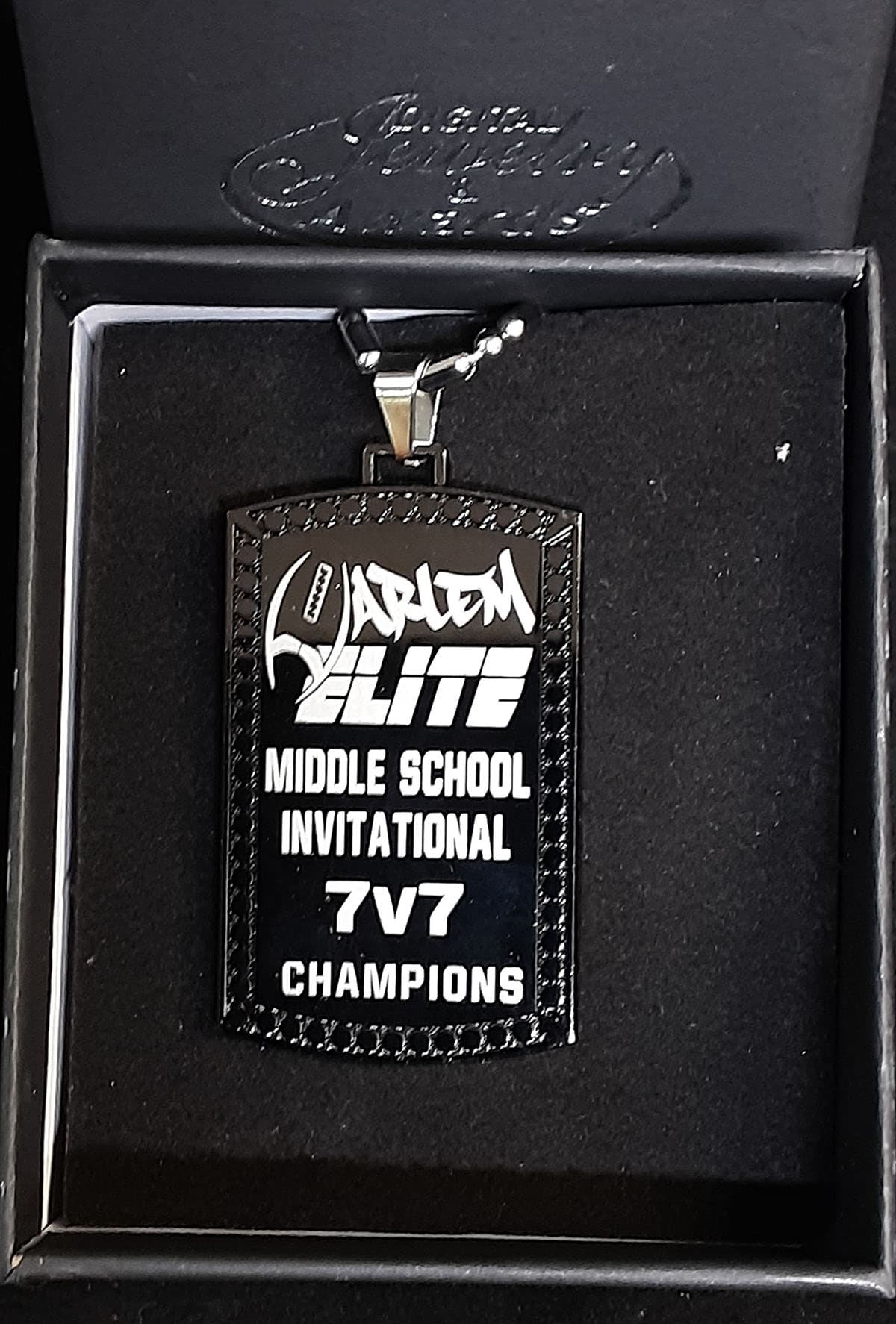 Xpress custom laser-engraved stainless steel dog tags for sports teams