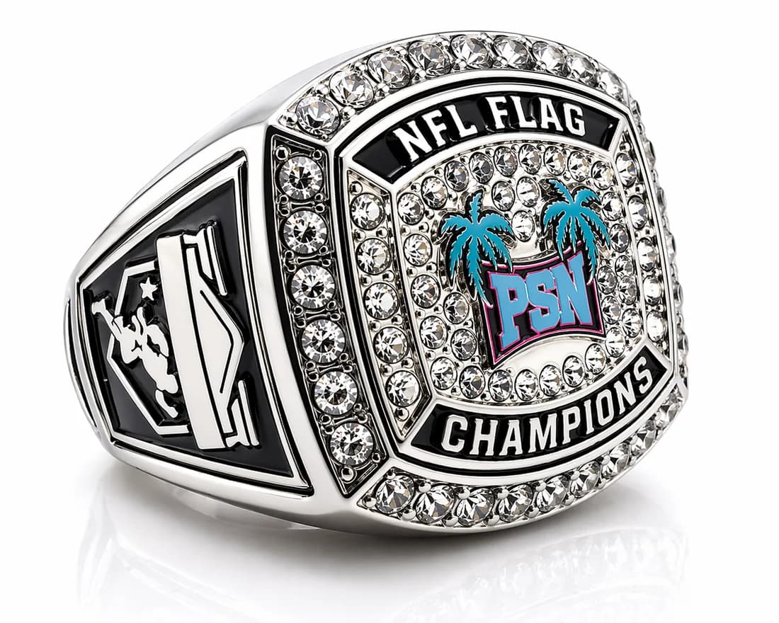 Flag Football Champion Rings by Colucci Custom Awards — a finished ring photographed in the workshop