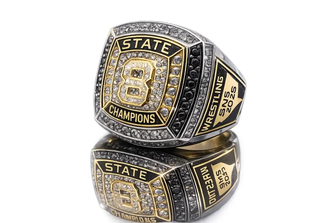 Finished custom championship ring by Colucci Custom Awards, shown here as a state champions ring. Your own artwork replaces the design shown.