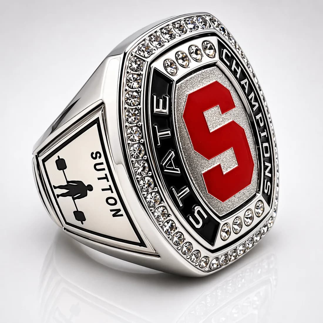 Finished custom championship ring by Colucci Custom Awards, shown here as a state champions ring. Your own artwork replaces the design shown.