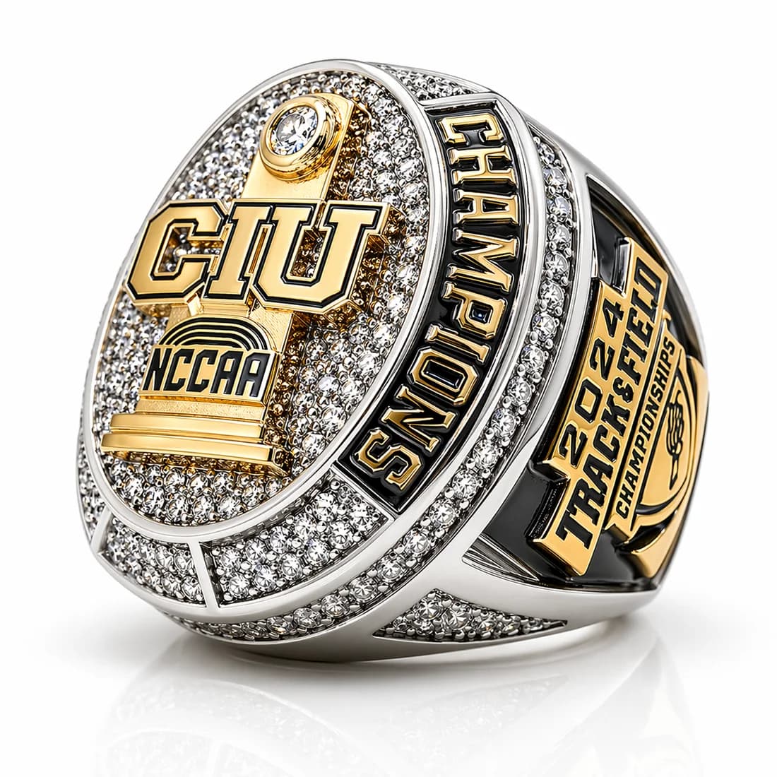 Finished custom championship ring by Colucci Custom Awards, shown here as a track and field champions ring. Your own artwork replaces the design shown.